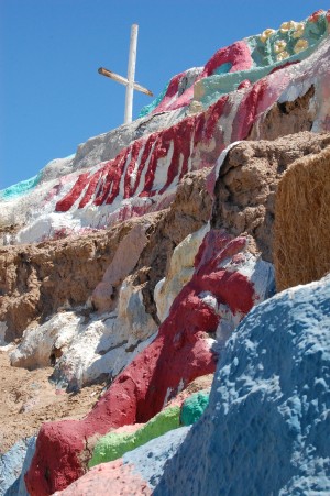 A waterfall of paint, hay, mud, and wood.