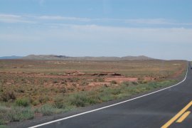 Crater Rim of Meteor Crater, now starting to loom larger, still in the middle distance.