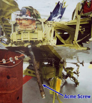 "Photo of Horizontal stabilizer and trim motor assembly, with jackscrew, as recovered from the ocean"